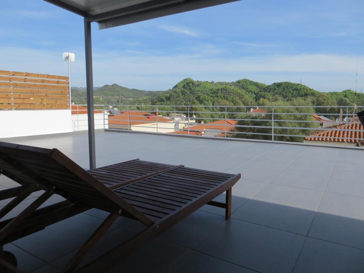 Leonidaion Guesthouse Ancient Olympia Екстер'єр фото A roof terrace in Spain